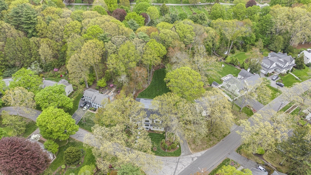 30 Hobart Road Wellesley, MA 02482 - Photo 3 of 40 a view of a garden with a fountain