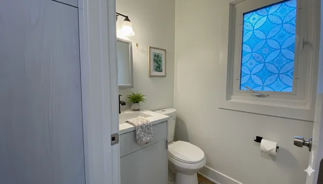 a bathroom with a sink and toilet