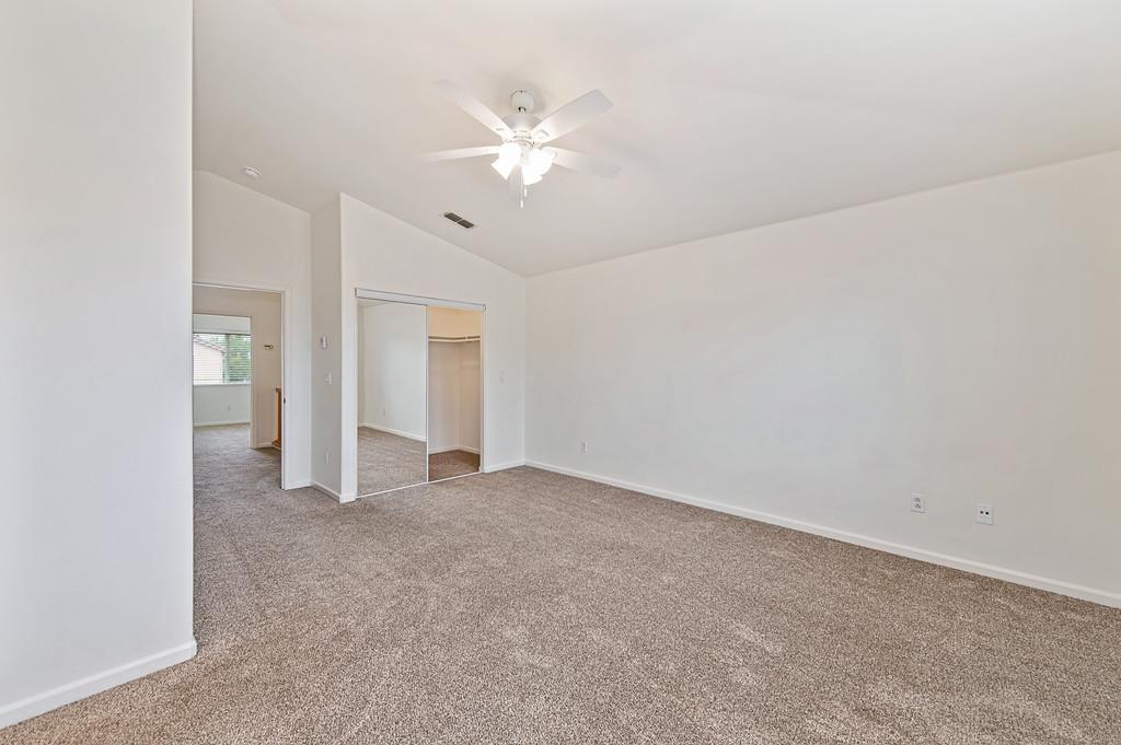 3524 Riojo Way Rancho Cordova, CA 95670 - Photo 34 of 47 an empty room with closet and fan