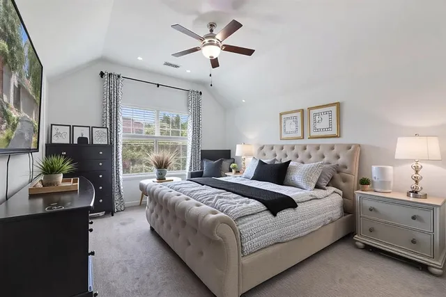 a kitchen with appliances a refrigerator and cabinets