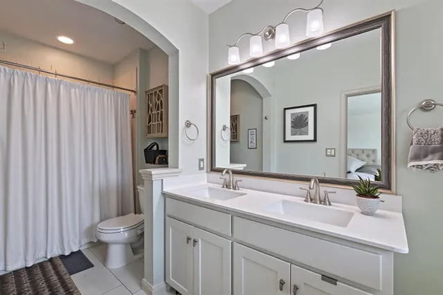 a bed room with bed and window