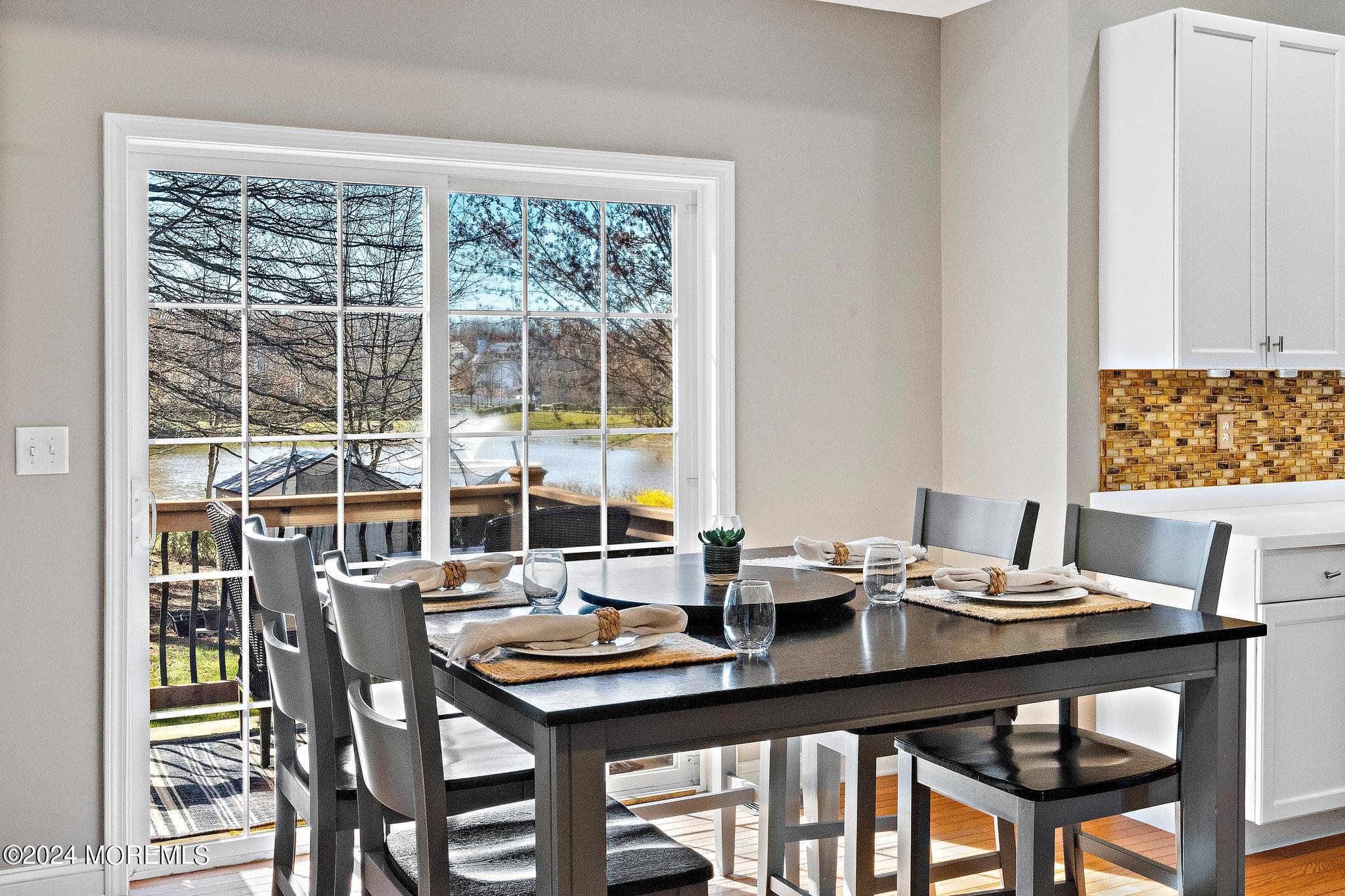 25 Firestone Drive Howell, NJ 07731 - Photo 13 of 65 a view of a dining room with a table and chairs