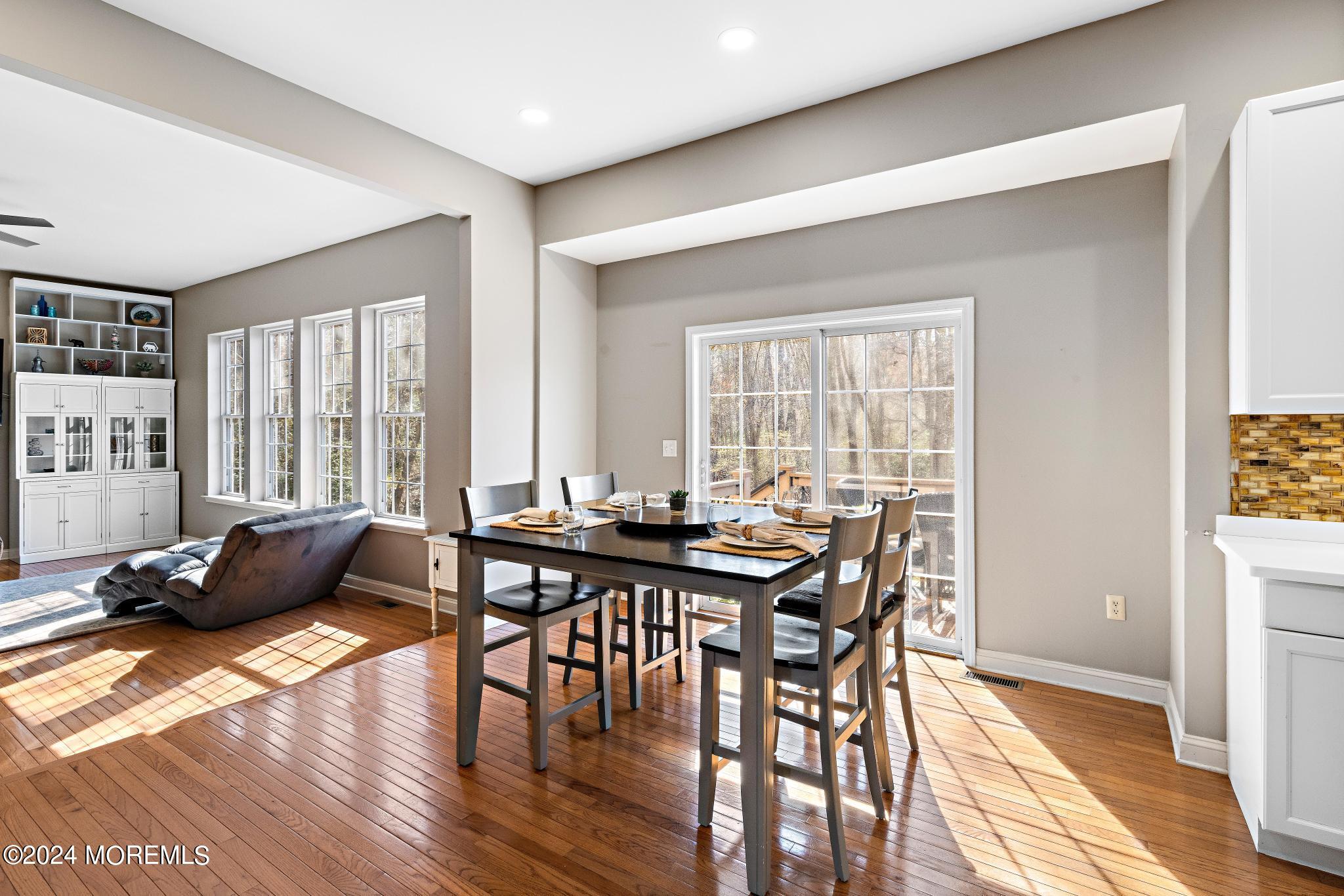 25 Firestone Drive Howell, NJ 07731 - Photo 14 of 65 a view of a dining room with furniture window and wooden floor