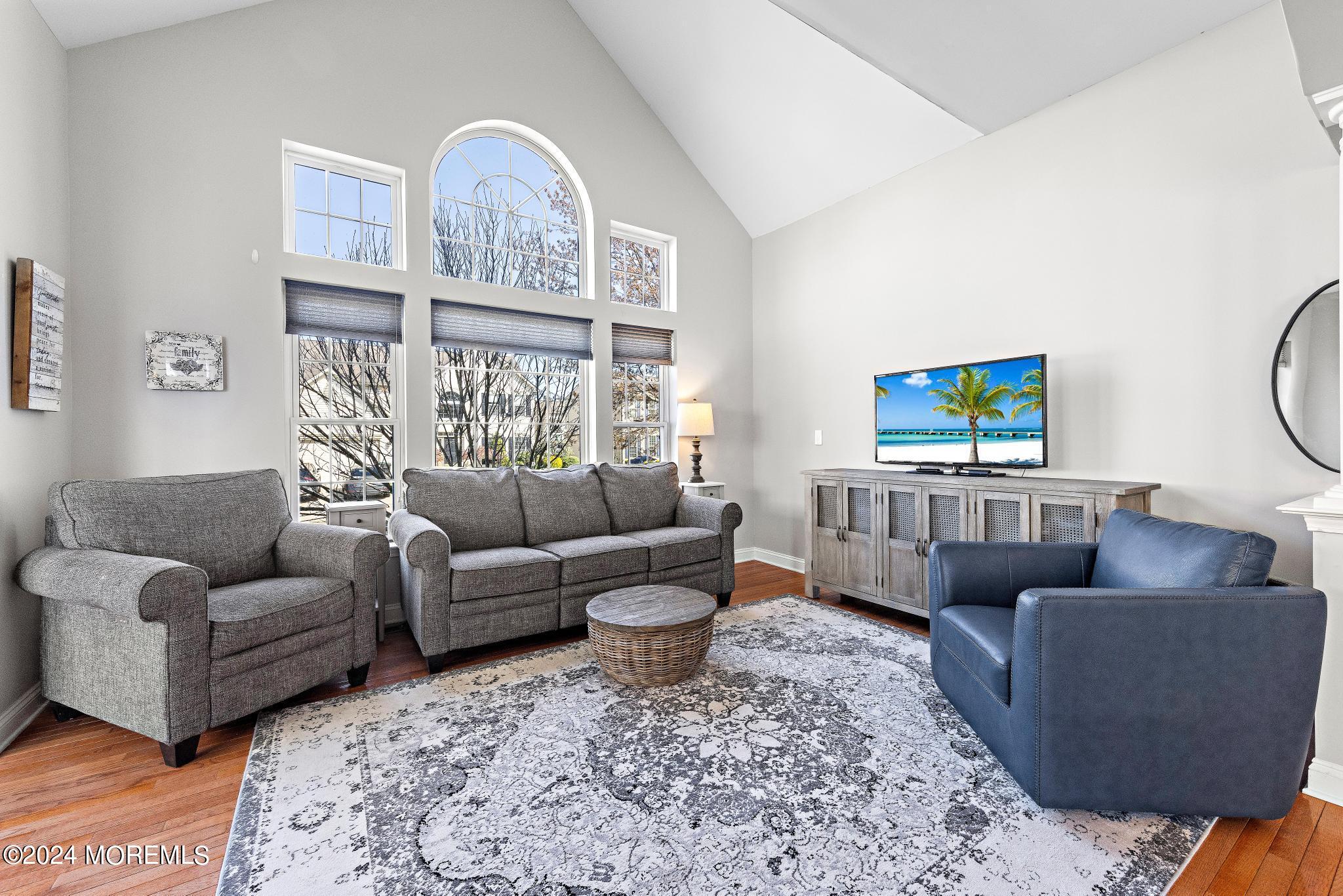 25 Firestone Drive Howell, NJ 07731 - Photo 16 of 65 a living room with furniture and a window