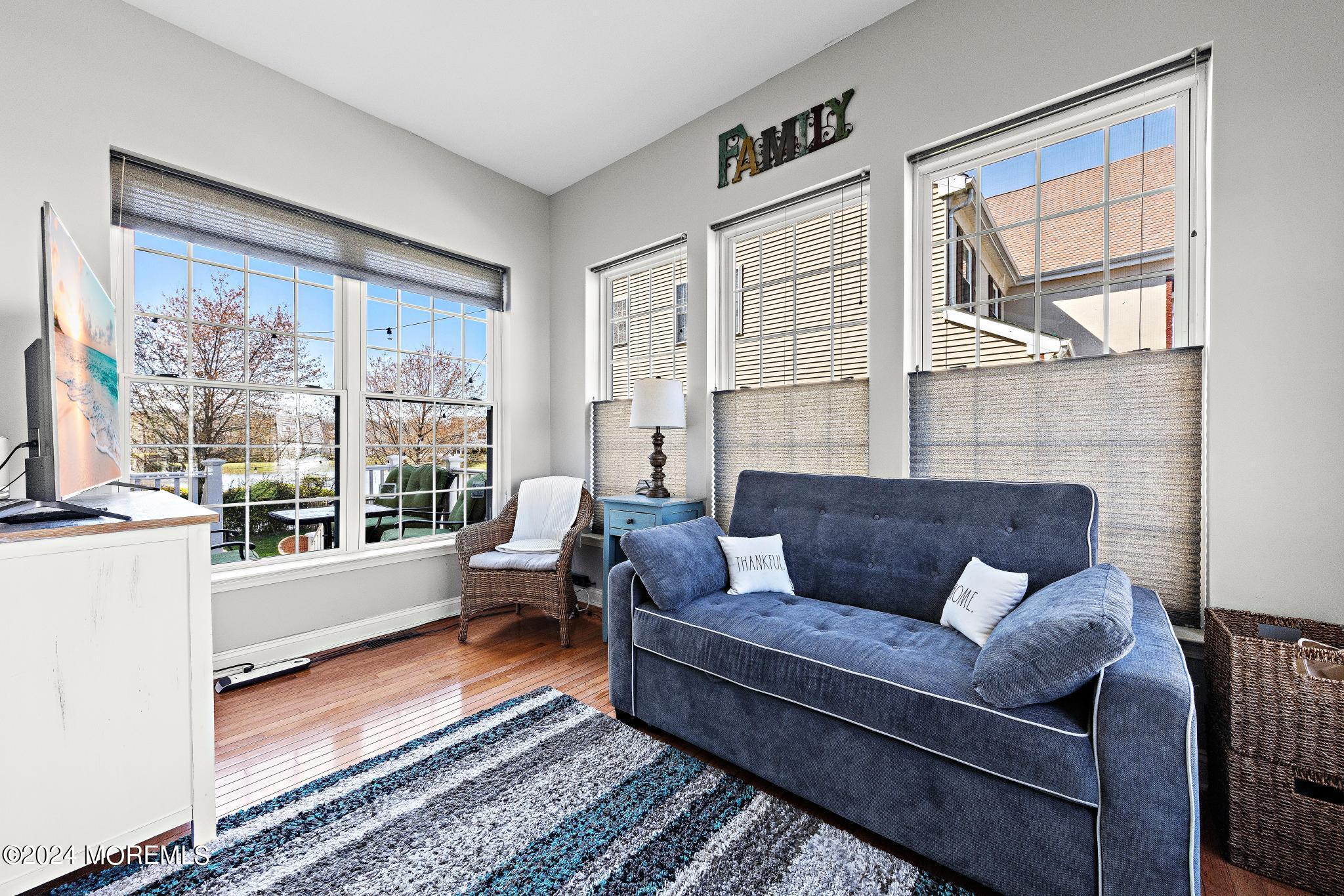 25 Firestone Drive Howell, NJ 07731 - Photo 21 of 65 a living room with furniture and a window