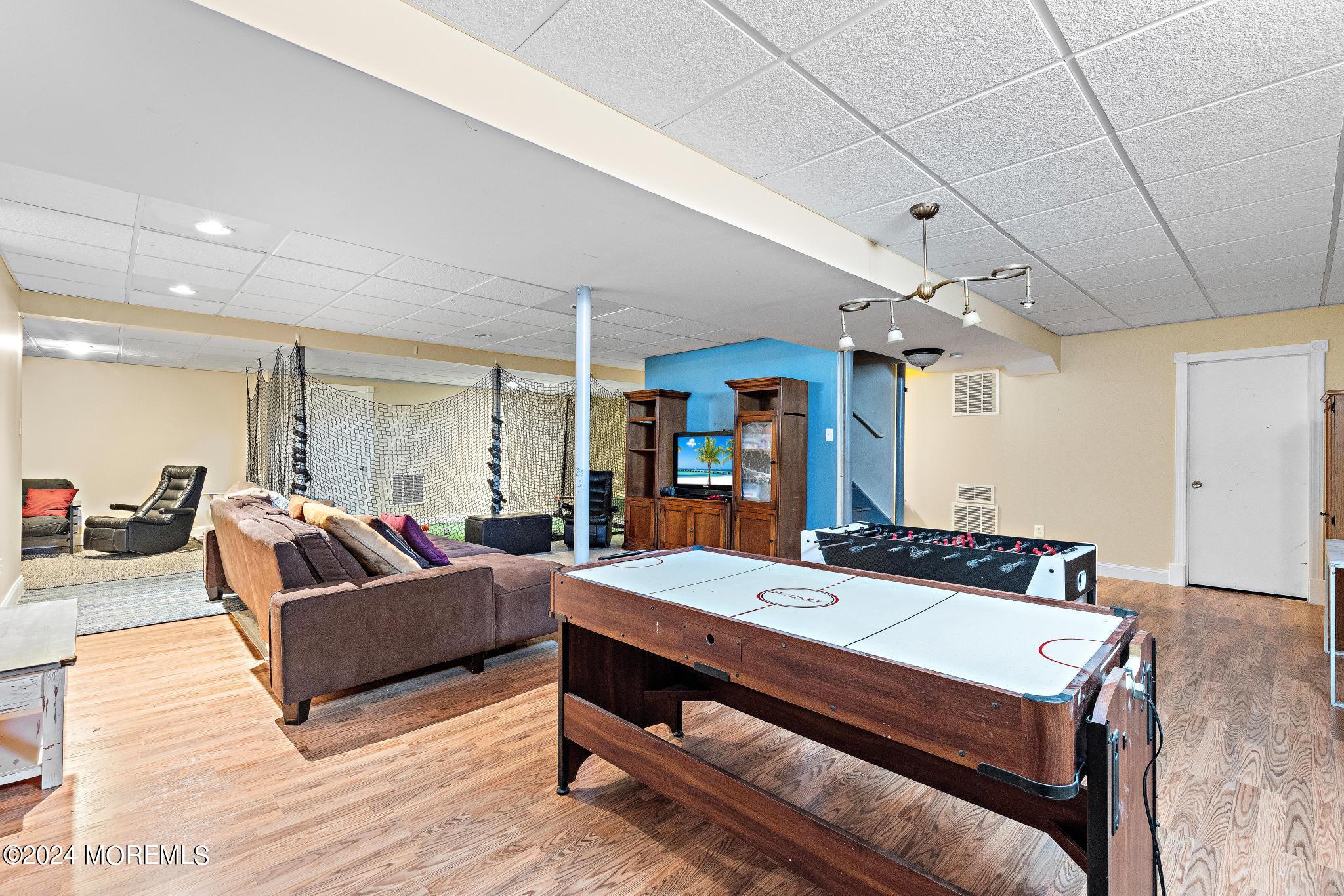 25 Firestone Drive Howell, NJ 07731 - Photo 38 of 65 a living room with furniture and a table