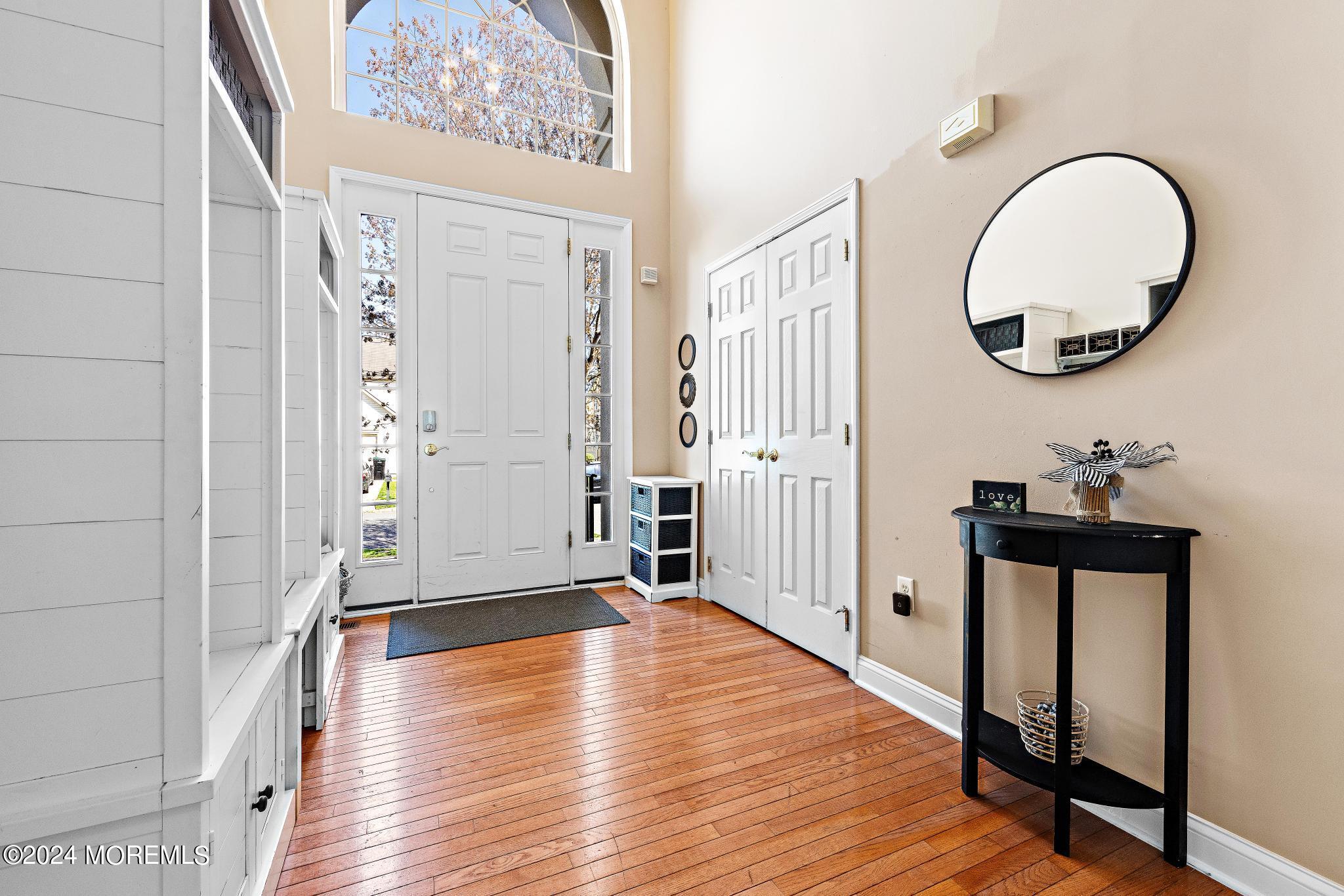 25 Firestone Drive Howell, NJ 07731 - Photo 5 of 65 a view of a room with wooden floor and entryway