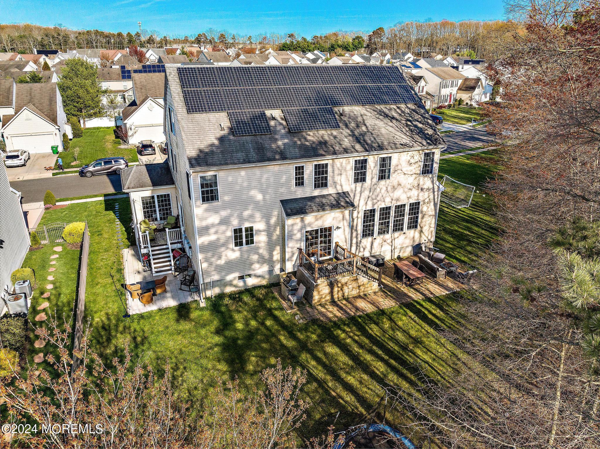 25 Firestone Drive Howell, NJ 07731 - Photo 58 of 65 an aerial view of a house with a yard