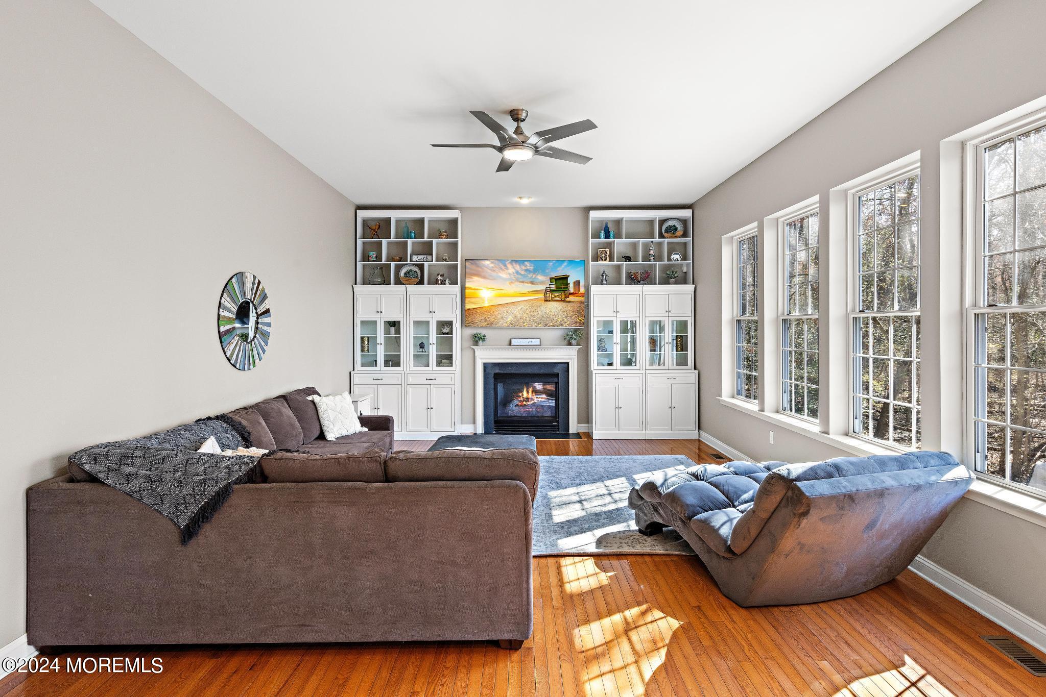 25 Firestone Drive Howell, NJ 07731 - Photo 6 of 65 a living room with furniture and a fireplace