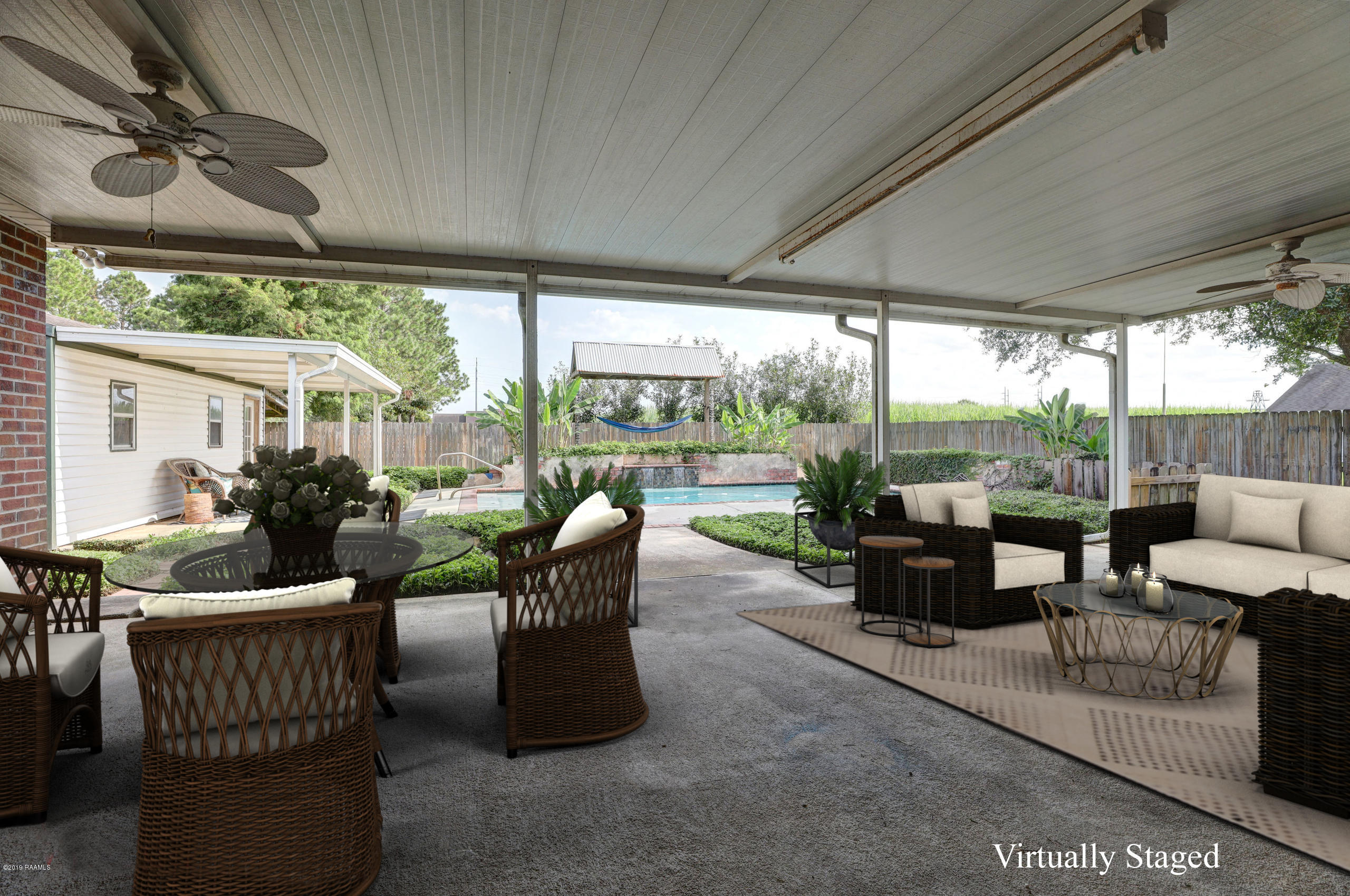 620 Almonaster Road Youngsville, LA 70592 - Photo 27 of 38 620 Almonaster PATIO vs