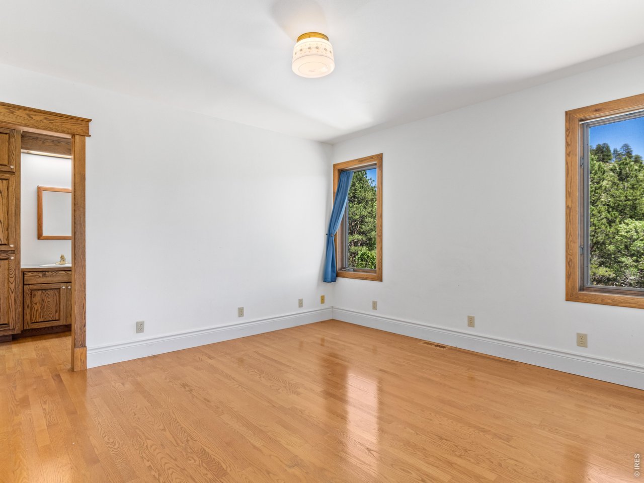 2180 Devils Gulch Road Estes Park, CO 80517 - Photo 27 of 40 Hardwood flooring in primary