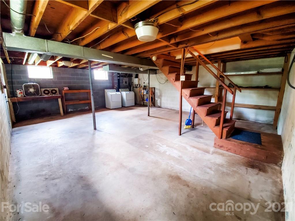 160 Huffstetler Lake Road Dallas, NC 28034 - Photo 14 of 14 a view of a big room with wooden ceiling