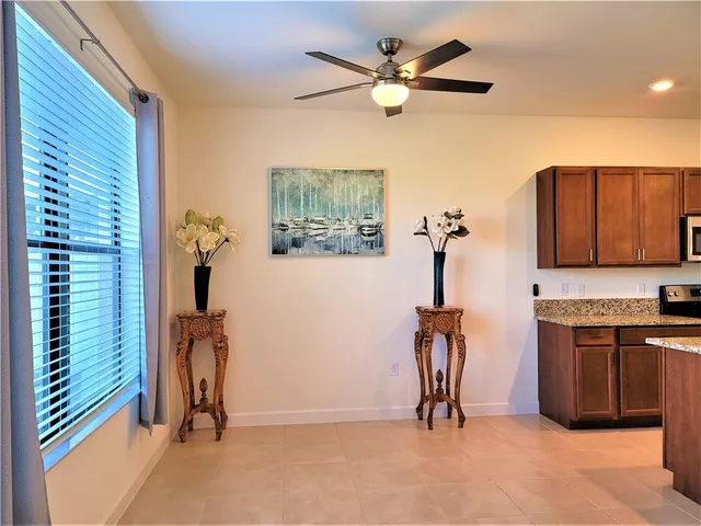 a view of a livingroom with furniture and a chandelier