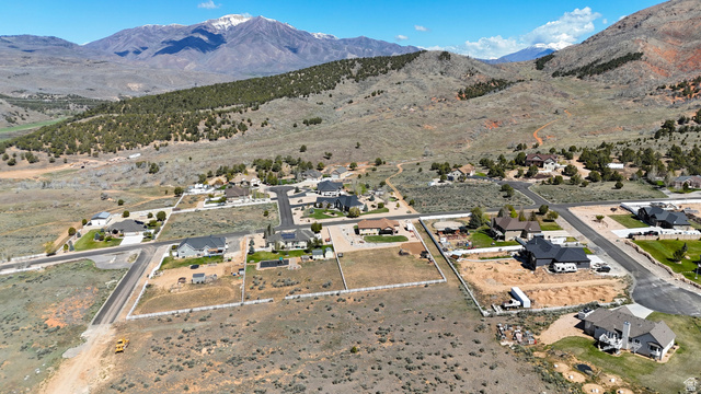 4953 West Cougar Run Road, Unit 20 Fairview, UT 84629 - Photo 9 of 14 Aerial perspective of suburban area featuring mountains