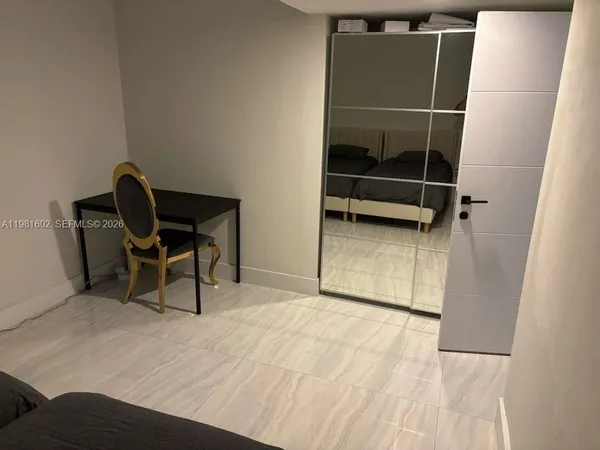 a room with furniture and a window