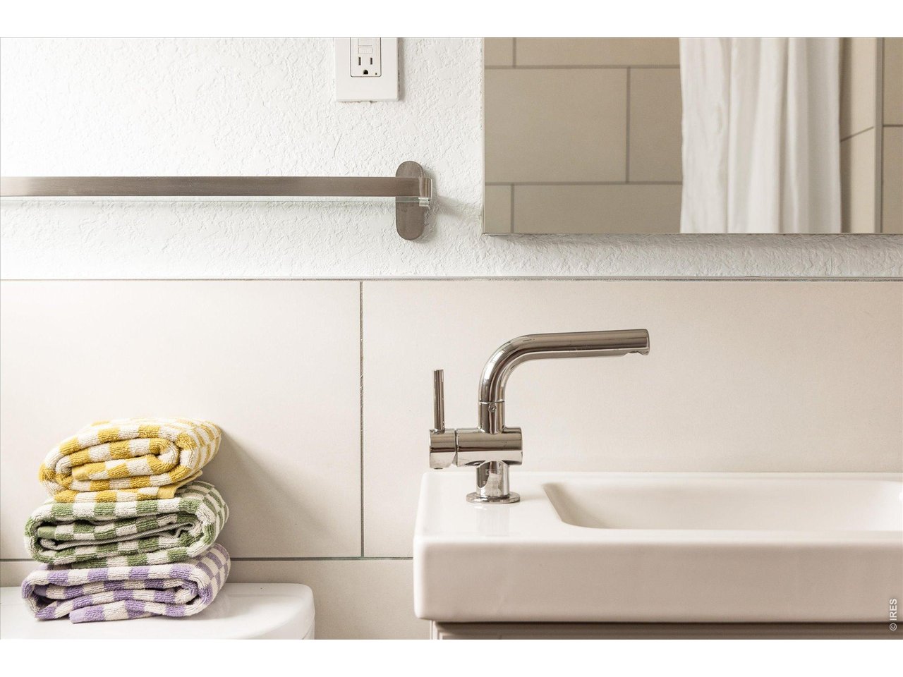 3217 Broadway Boulder, CO 80304 - Photo 16 of 30 a bathroom with a bathtub
