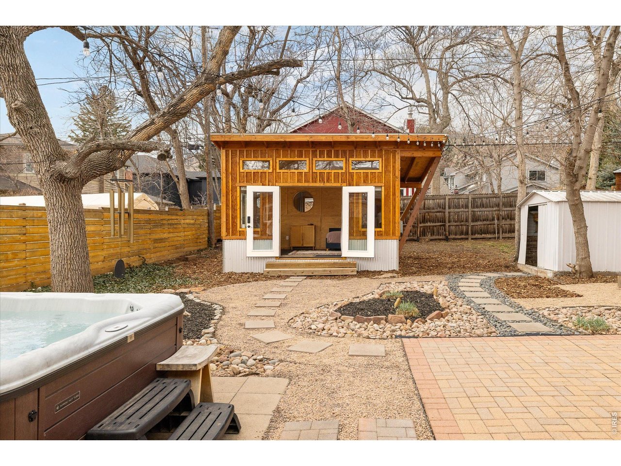 3217 Broadway Boulder, CO 80304 - Photo 24 of 30 a front view of a house with a yard