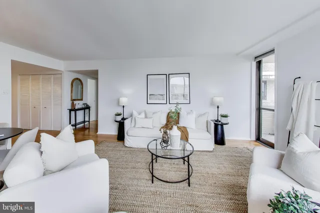 a living room with furniture and window