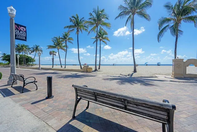 a view of street with a table and chairs