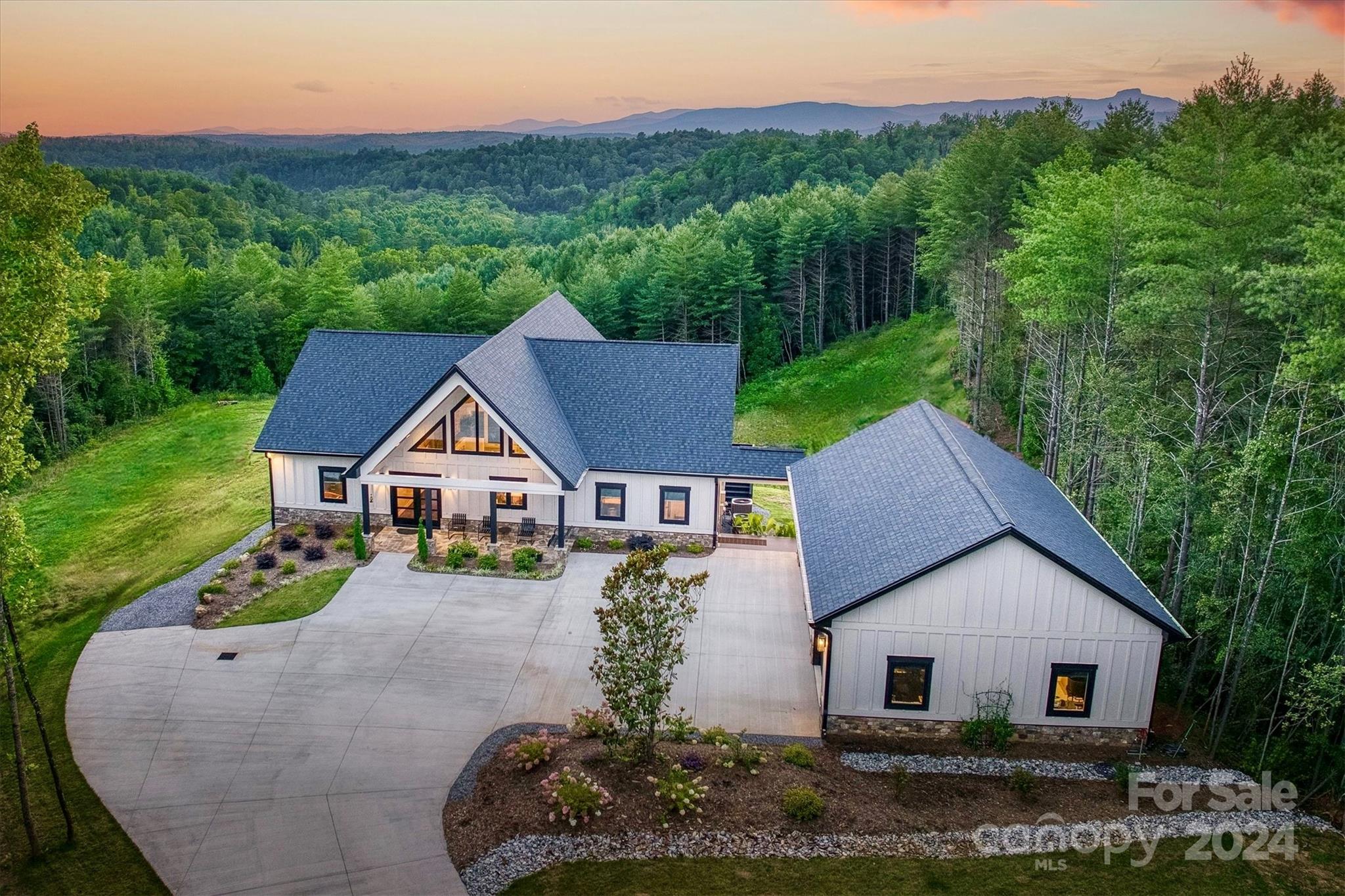 6140 Painted Rdg Trail Lenoir, NC 28645 - Photo 1 of 47 an aerial view of a house