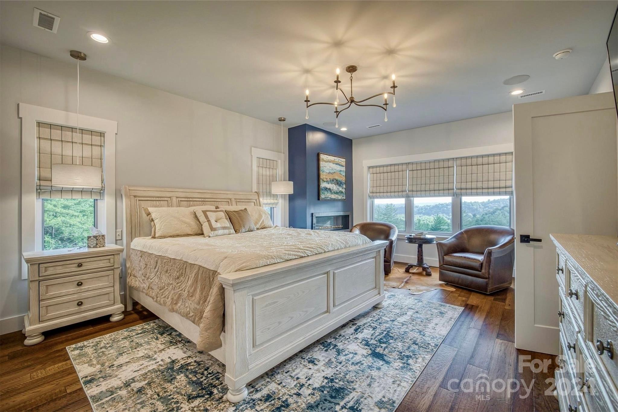 6140 Painted Rdg Trail Lenoir, NC 28645 - Photo 14 of 47 a bedroom with a large bed and a window