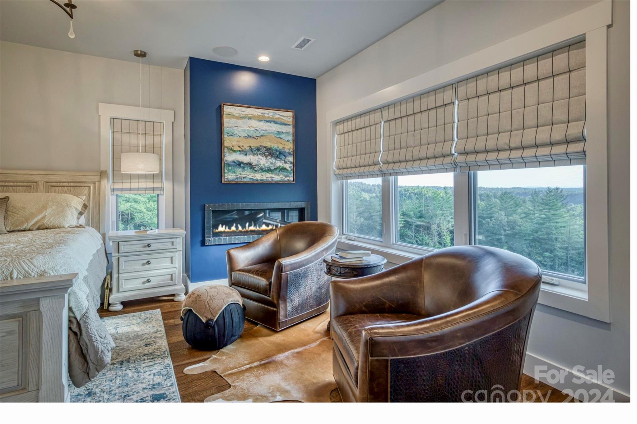 6140 Painted Rdg Trail Lenoir, NC 28645 - Photo 15 of 47 a living room with furniture and a floor to ceiling window