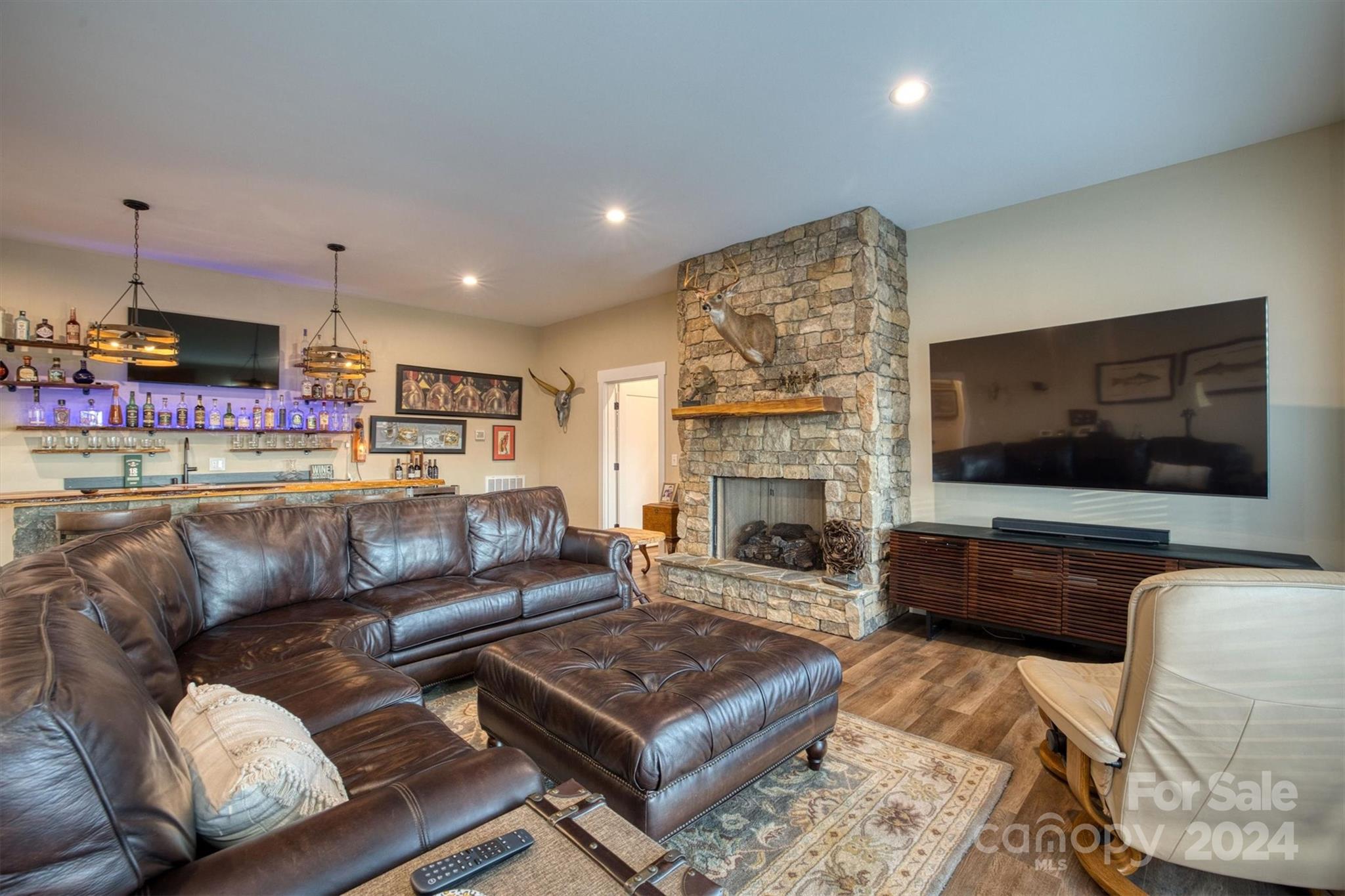 6140 Painted Rdg Trail Lenoir, NC 28645 - Photo 22 of 47 a living room with furniture and a flat screen tv