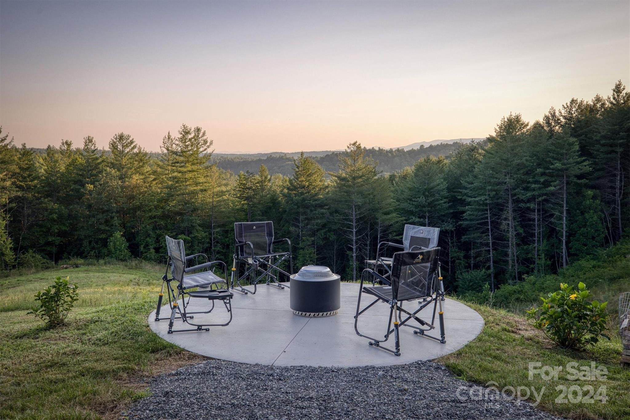 6140 Painted Rdg Trail Lenoir, NC 28645 - Photo 29 of 47 a view of a table and chairs in patio