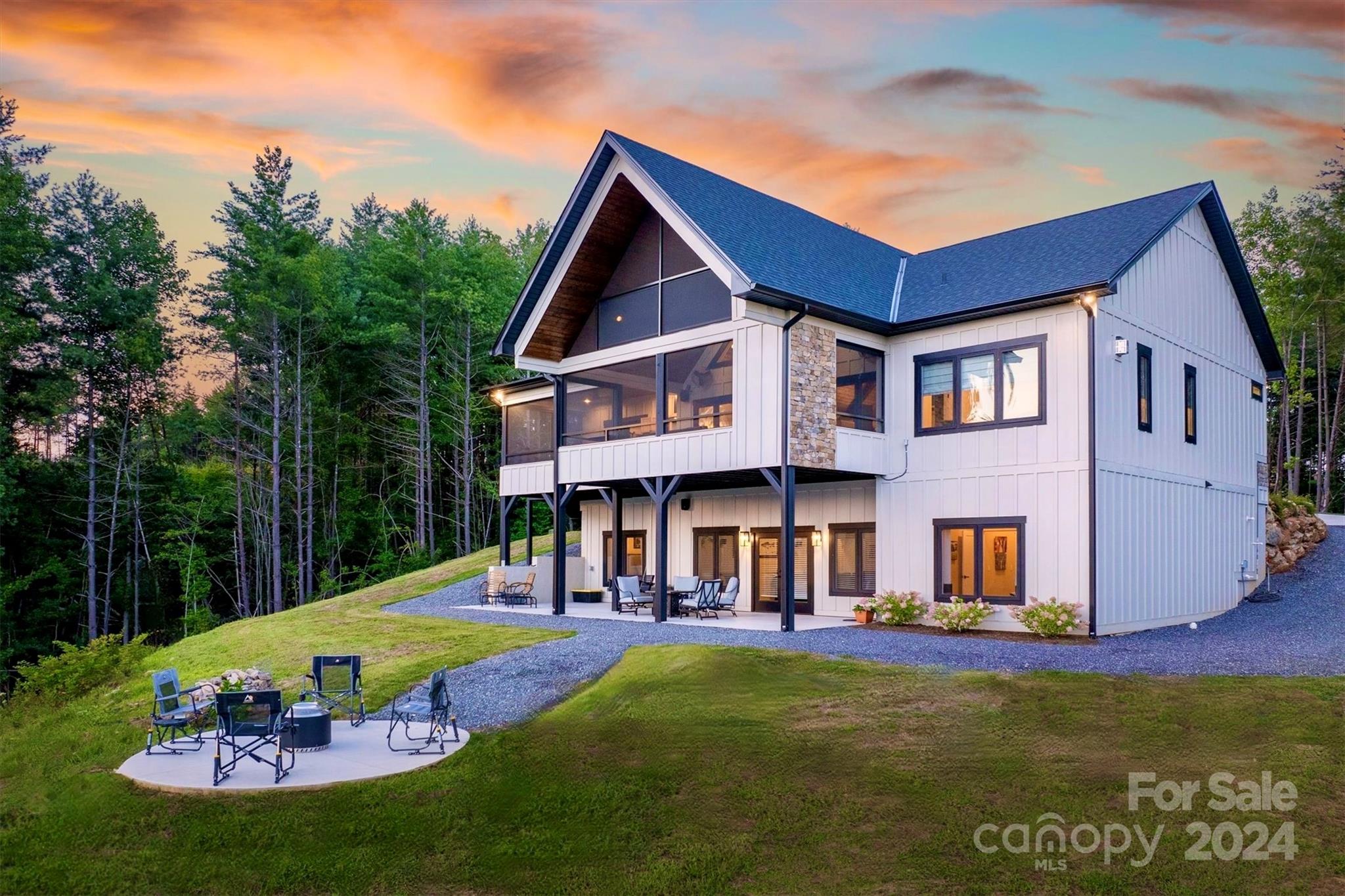 6140 Painted Rdg Trail Lenoir, NC 28645 - Photo 4 of 47 a view of a house with pool and a yard