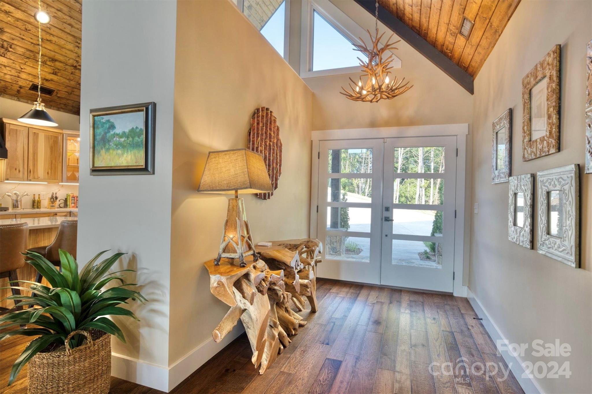 6140 Painted Rdg Trail Lenoir, NC 28645 - Photo 6 of 47 a view of hall way with furniture and chandelier