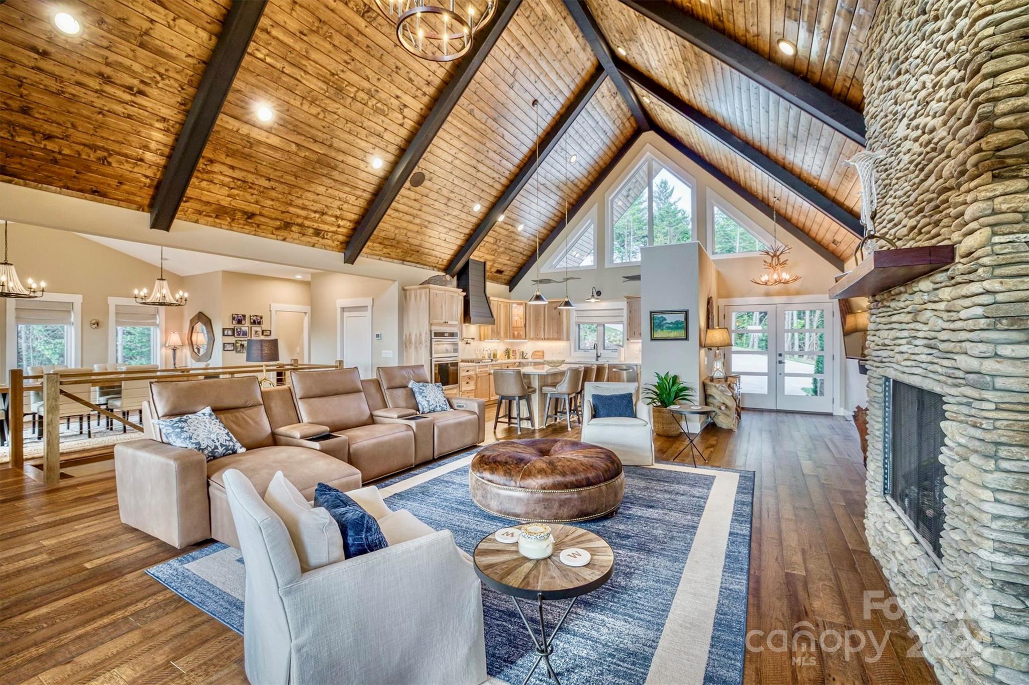 6140 Painted Rdg Trail Lenoir, NC 28645 - Photo 8 of 47 a living room with furniture and a fireplace