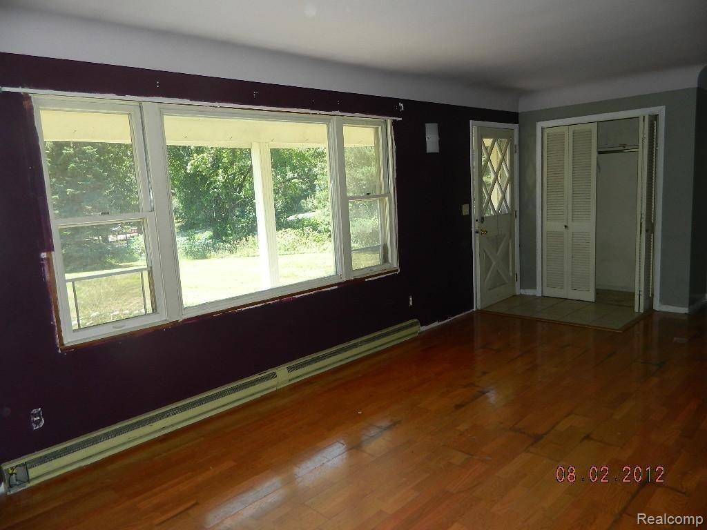 17992 Waterloo Road Chelsea, MI 48118 - Photo 2 of 6 32372872 Living Room.jpg