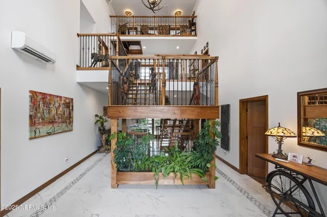 a bedroom with furniture and a flat screen tv