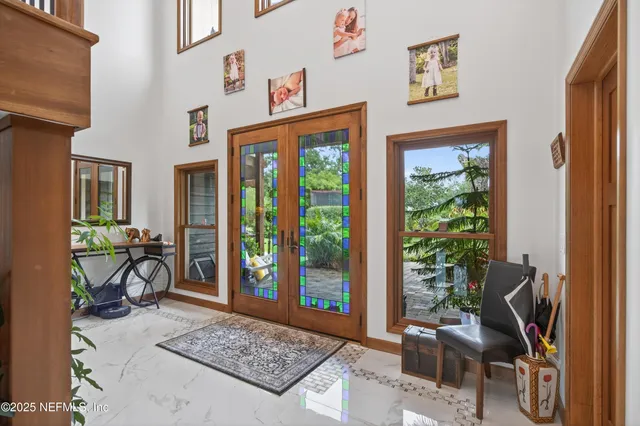 a bathroom with a double vanity sink mirror and double