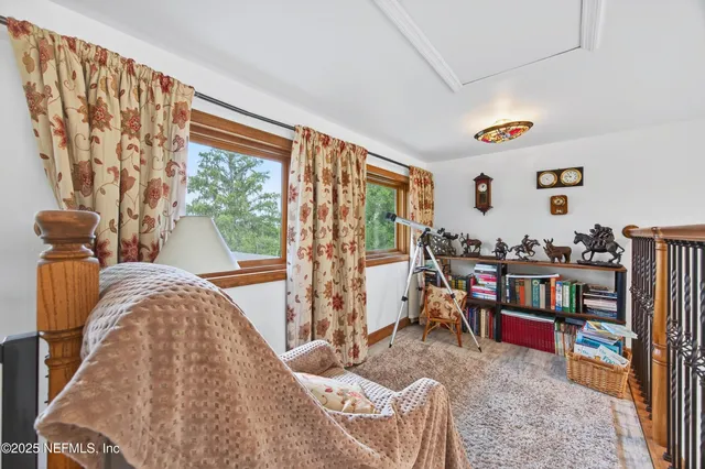 a room with furniture and window