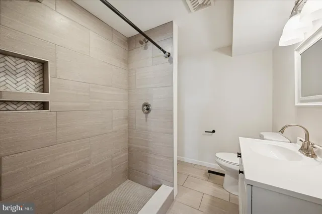 a bathroom with a sink and a toilet