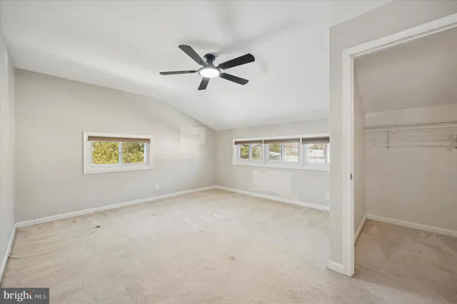 a bed room with a bed and a couch