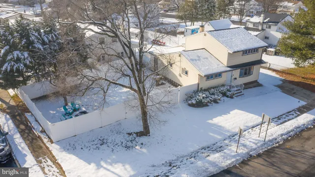 an aerial view of a house having patio