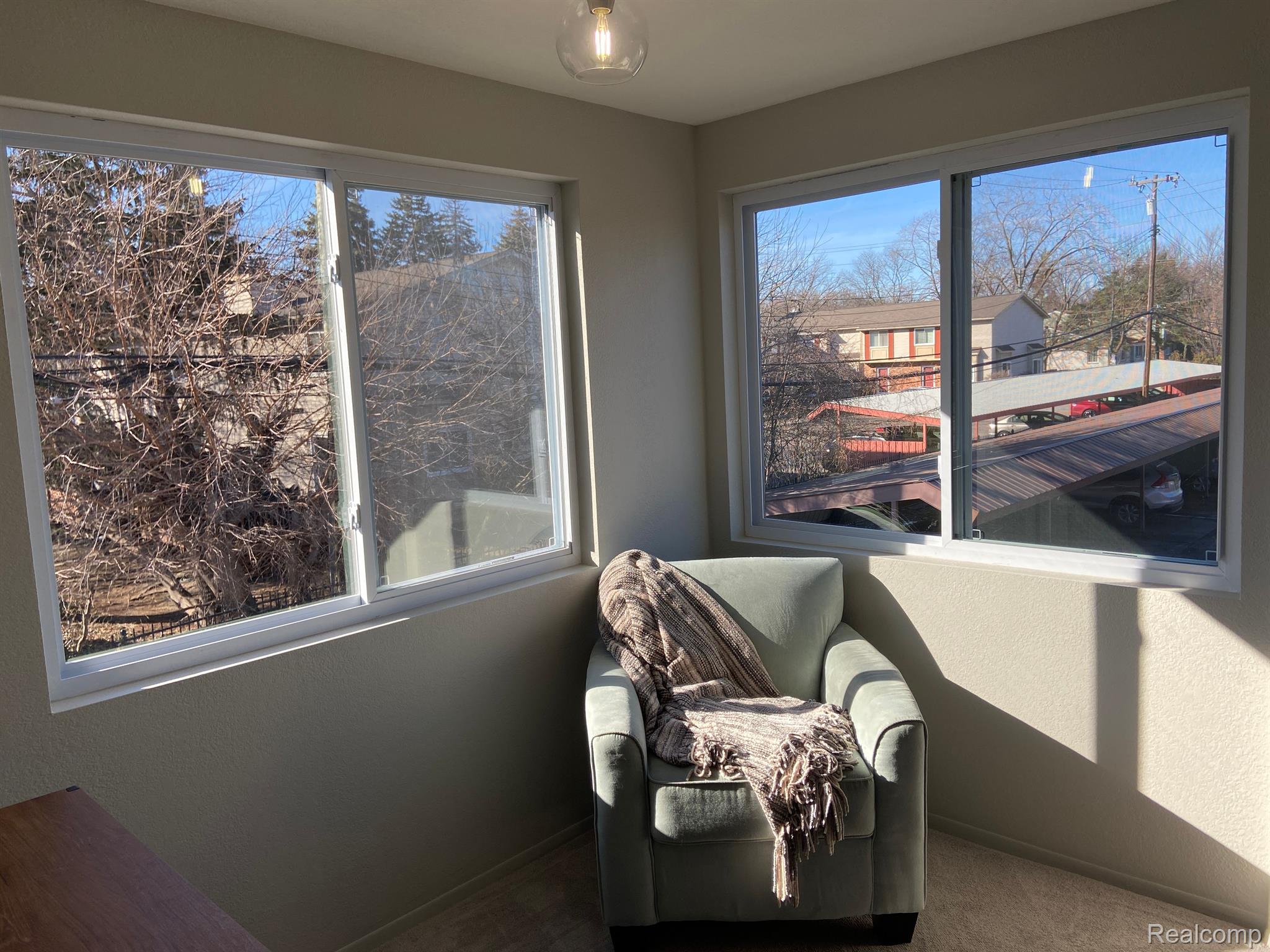 5045 North Crooks Road, Unit 20 Royal Oak, MI 48073 - Photo 21 of 46 Primary Bedroom sitting area with nice views