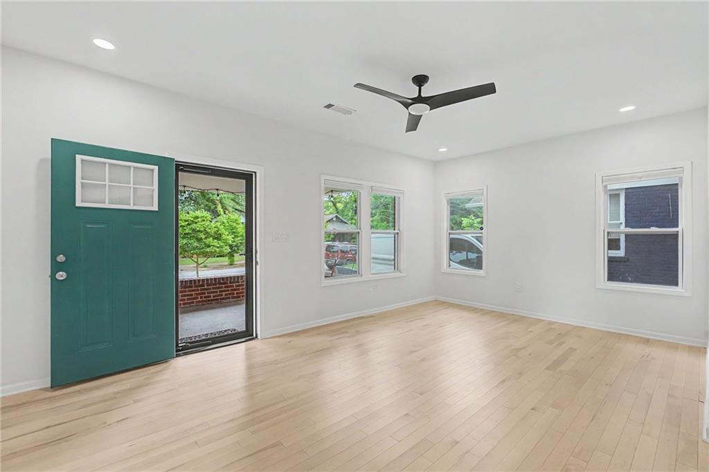 827 Elbert Street Southwest Atlanta, GA 30310 - Photo 2 of 33 an empty room with windows and closet