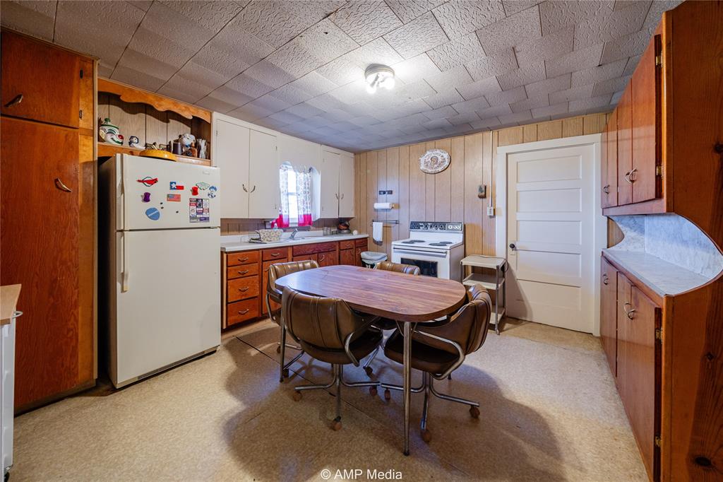 1992 Sand Flat Road Jacksboro, TX 76458 - Photo 20 of 36 Kitchen featuring sink and white appliances