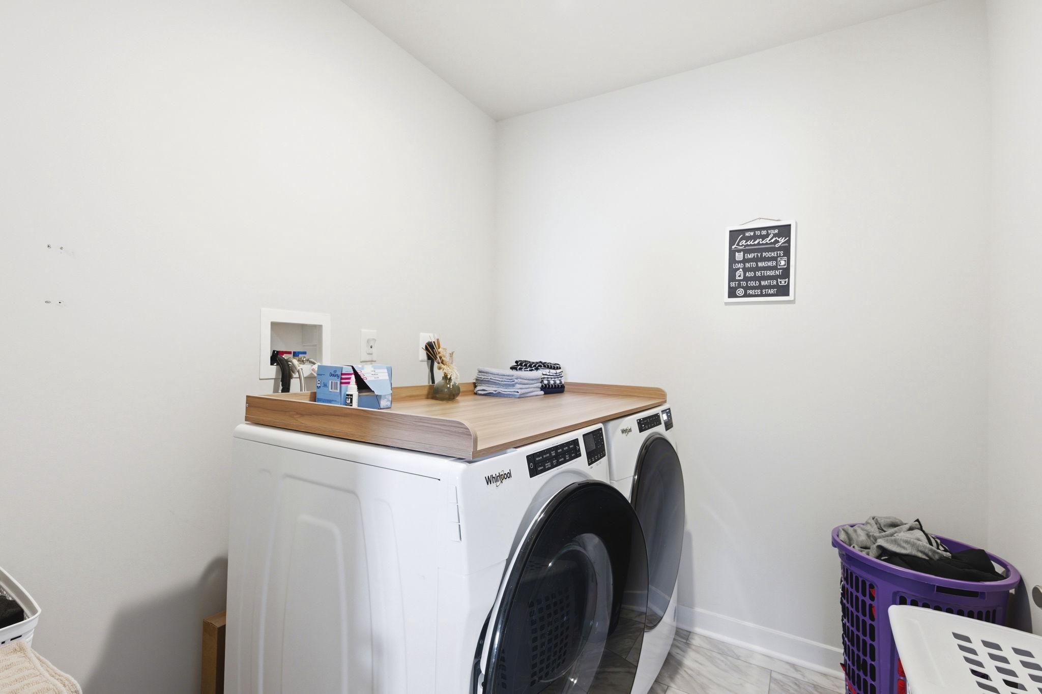 727 Hunsberger Road Spring City, PA 19475 - Photo 35 of 56 Modern laundry space sleek appliances upper level.