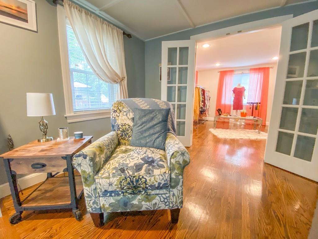 60 Old Brook Road Springfield, MA 01118 - Photo 18 of 42 a living room with furniture and a large window