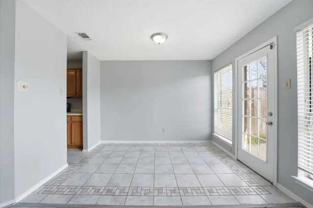 a view of an empty room with window