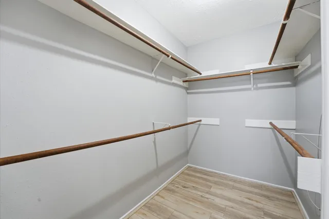 a view of an empty walk in closet