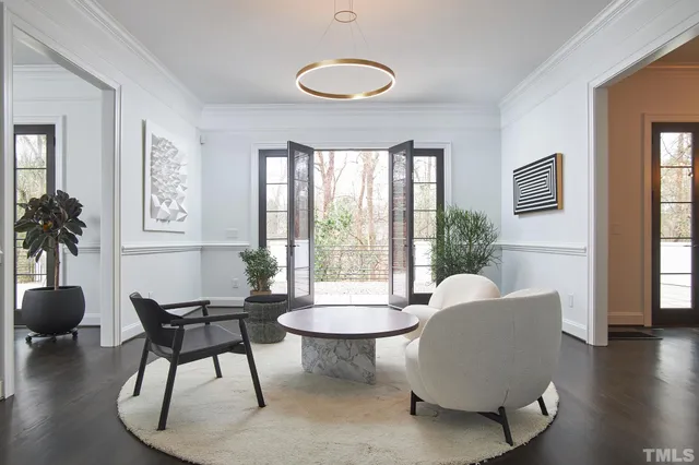 a kitchen with a stove a sink and a refrigerator