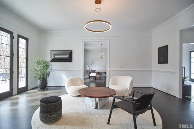 a kitchen with stainless steel appliances a stove a microwave and cabinets