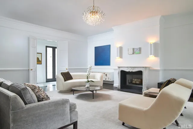 a spacious bathroom with a bathtub and sink