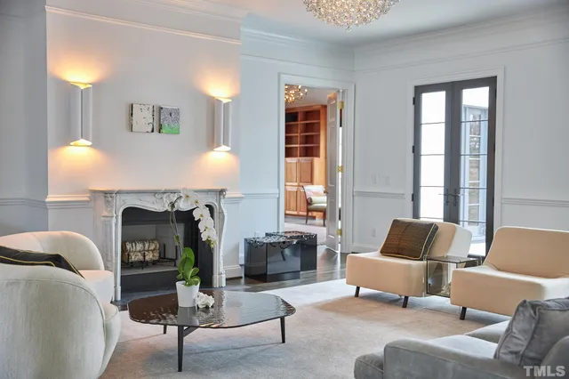 a spacious bathroom with a double vanity sink a mirror and a shower