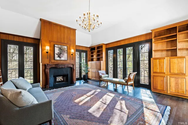 a bedroom with a bed and a night stand